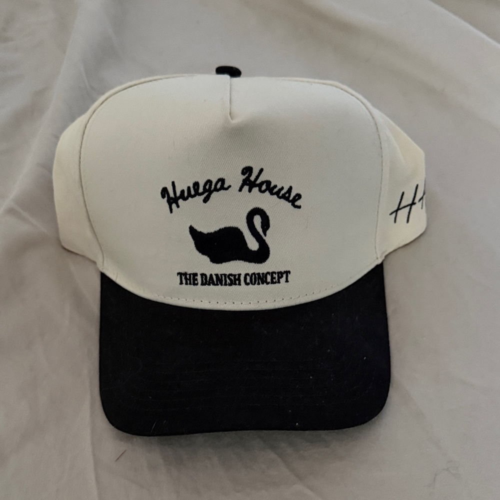 Huega House Black and White Cap. Never worn
